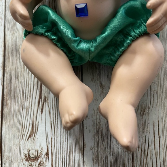 Collectible Porcelain Baby Doll Dressed in a Blue & Yellow Flower Costume - Picture 3 of 10